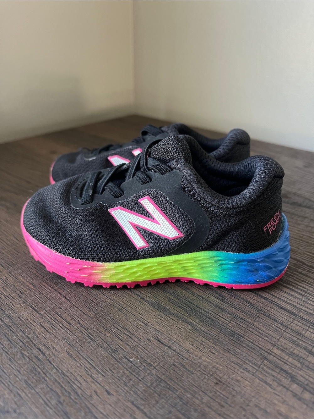 New Balance toddler Black Sneakers with Pink Logo and Rainbow sole size 5.5C
